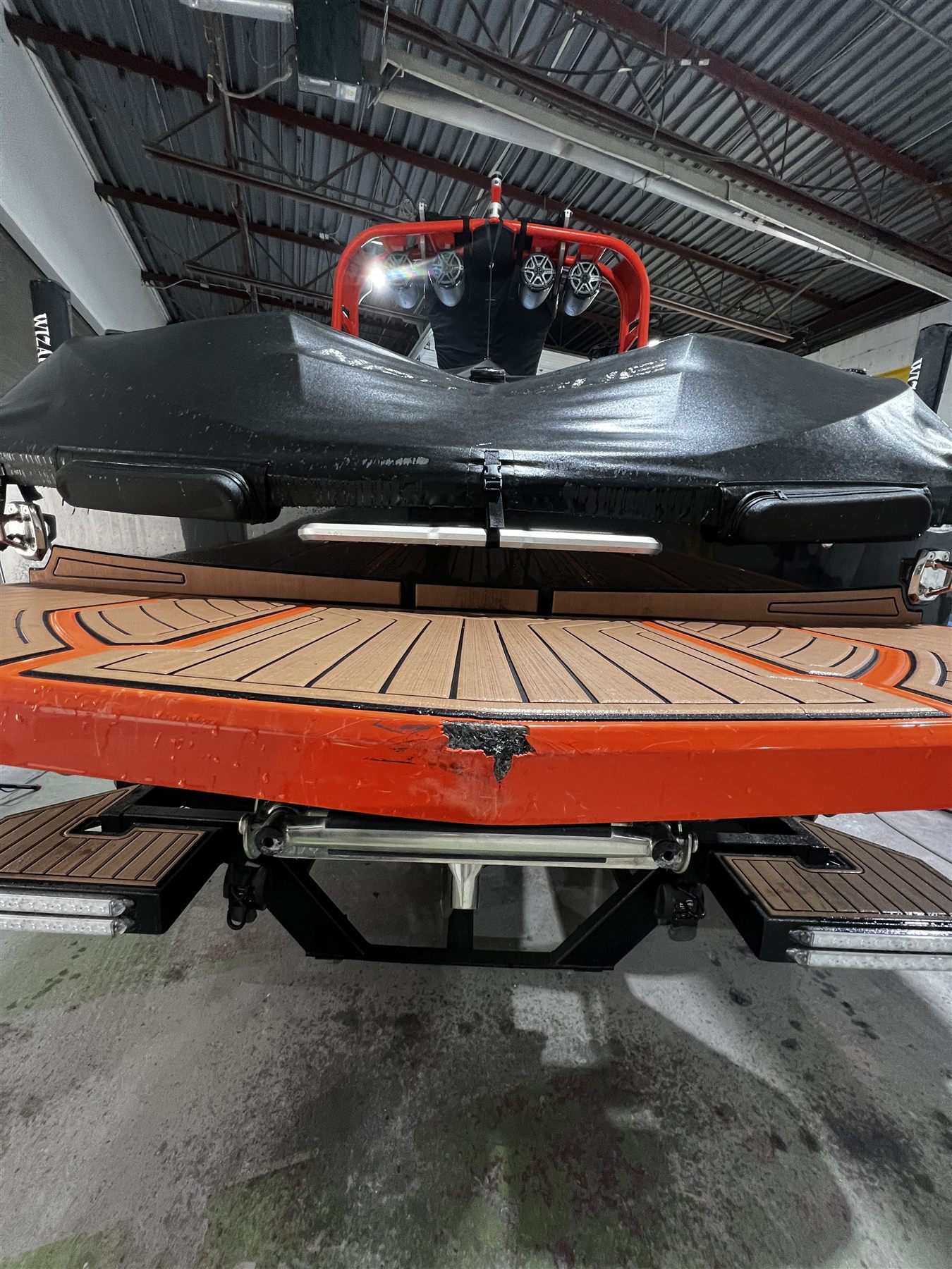 Damage on the edge of an orange swim platform